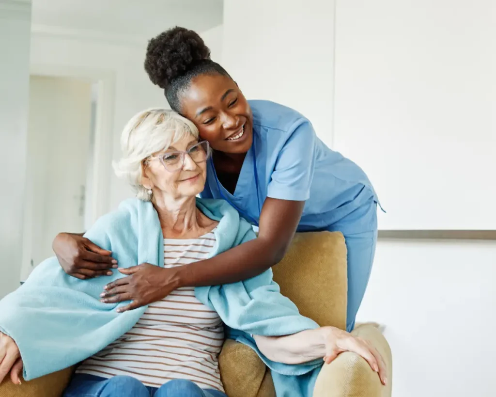 A Careline 24 carer enjoys a friendly, supportive walk and conversation with an active elderly client in the West Sussex community, promoting wellbeing and independence.