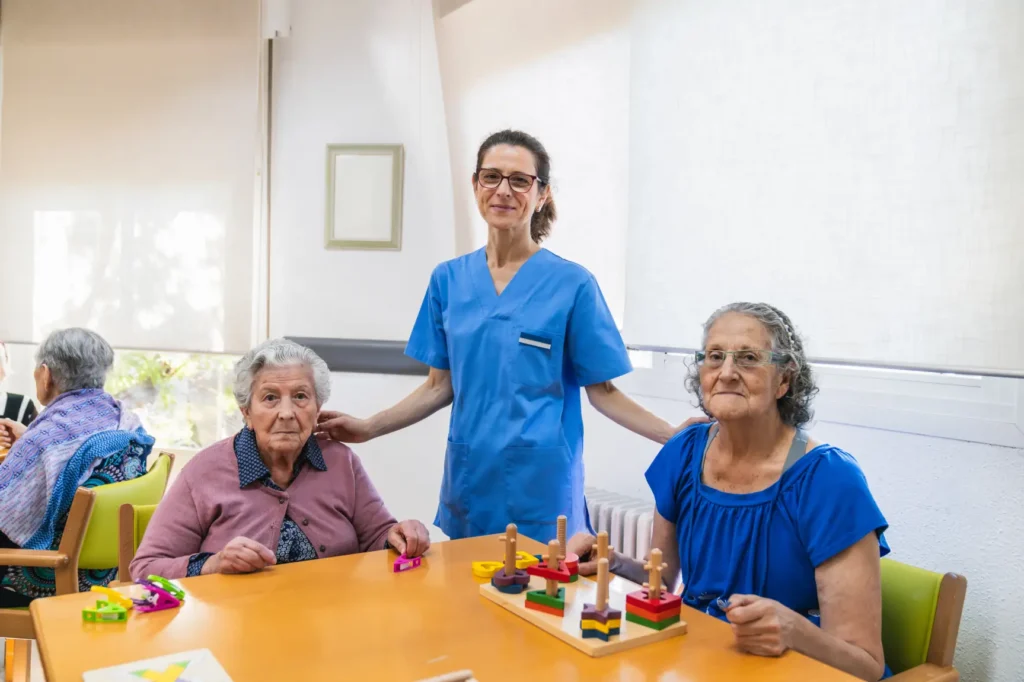 A compassionate, professional Careline 24 carer providing one-to-one support and conversation to a senior gentleman with dementia in his own home.
